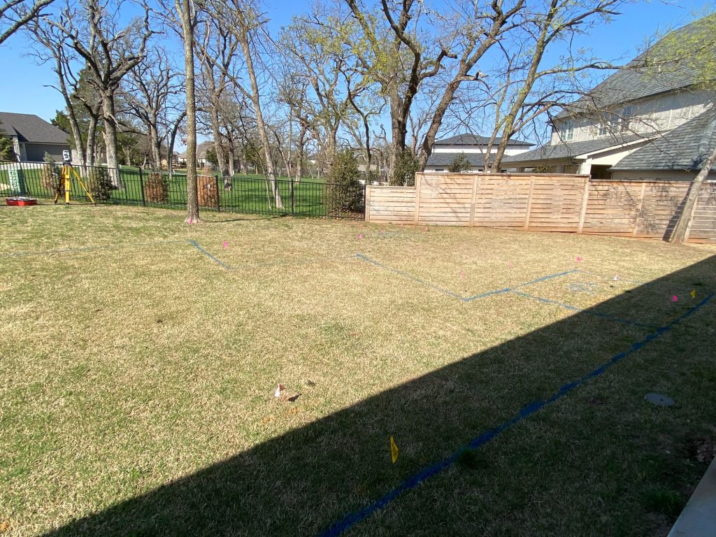 ool layout marked in backyard prior to excavation in Oak Tree East Edmond Oklahoma.