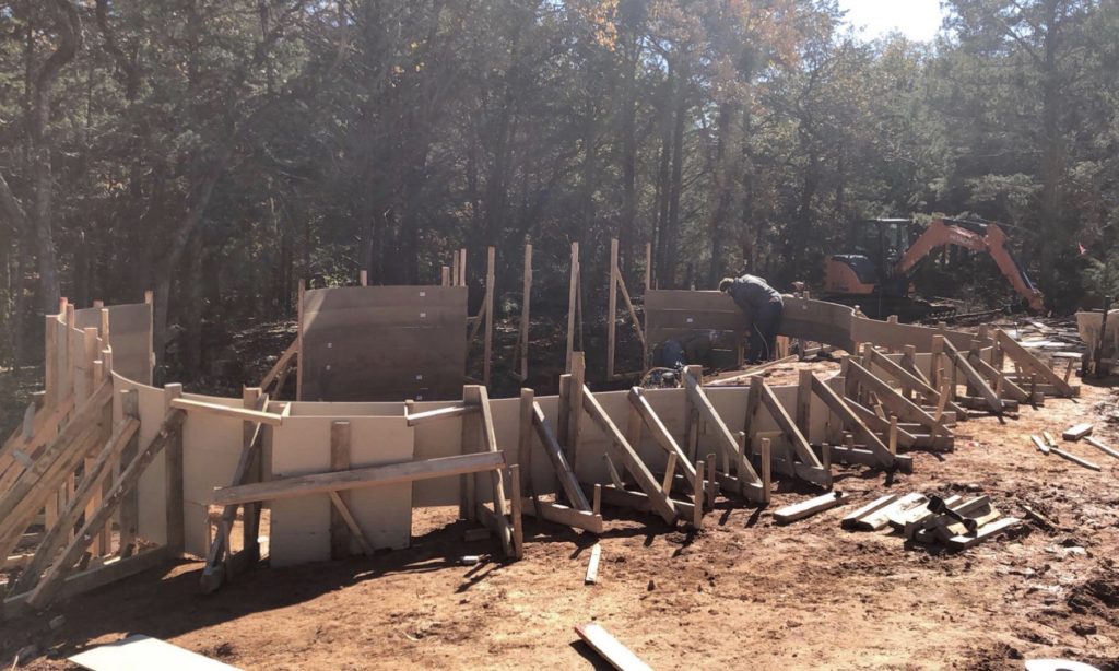 Pool construction showing structural forming and framing during build of freeform pool in Jones Oklahoma.