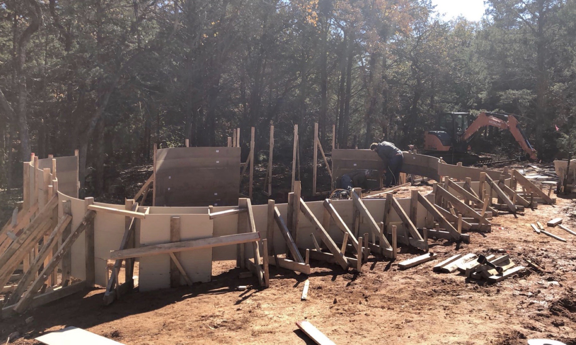 Pool construction showing structural forming and framing during build of freeform pool in Jones Oklahoma.